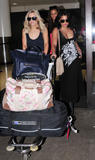 th_57817_The_Saturdays_Arriving_at_LAX_February_12_2012_02_122_170lo.jpg