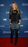 Jennifer Morrison pictures black stockings denim skirt at House 100th Episode Party in Los Angeles
