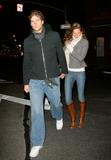 Gisele Bundchen in tight jeans and boots