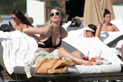 http://img181.imagevenue.com/loc238/th_311906425_Mischa_Barton_Bikini_Candids_on_the_Beach_in_Miami_December_27_2011_133_122_238lo.jpg