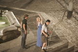 Kristen Bell with a bottle of whisky looks to be drunk in the fountain filming When in Rome