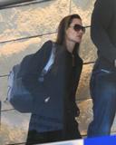 th_84413_Preppie_-_Angelina_Jolie_departing_LAX_Airport_-_Feb._7_2010_934_122_522lo.jpg