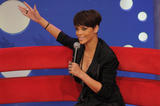Rihanna shows her legs in black mini dress on BET's 106 & Park at the BET Studios in New York City